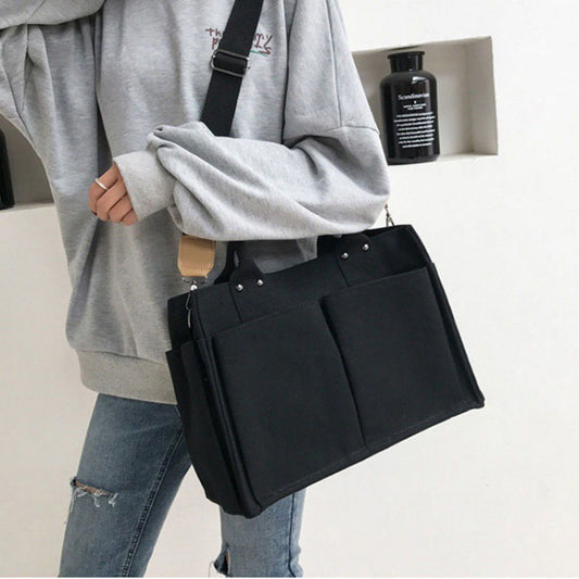 Bolsa Mensajero de Lona Grande con Capacidad Expandible