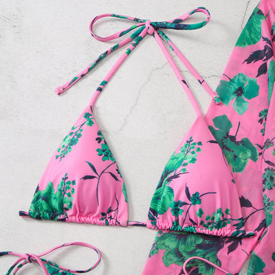 Milky white floral print three-piece swimsuit with triangle bikini top, v-cut bottom, and sheer long-sleeve cover-up. - Image 36