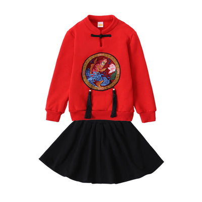 Family of four in matching red long-sleeve tops with a rabbit graphic, celebrating the Year of the Rabbit. - Image 8