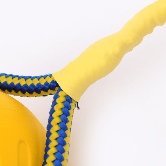 Yellow EVA pet training ball with a blue and yellow braided rope, suitable for dog play and training. - Image 14