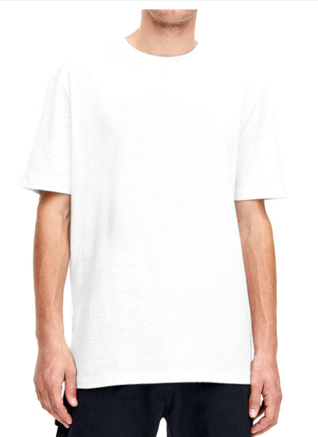 Plain light beige short-sleeved crew neck t-shirt made of cotton, shown on a model. - Image 24