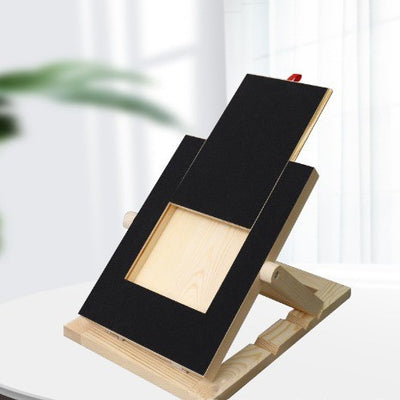 Black sandpaper refill sheets for a dog scratch board, displayed on a light wood stand, 5 pieces included. - Image 4