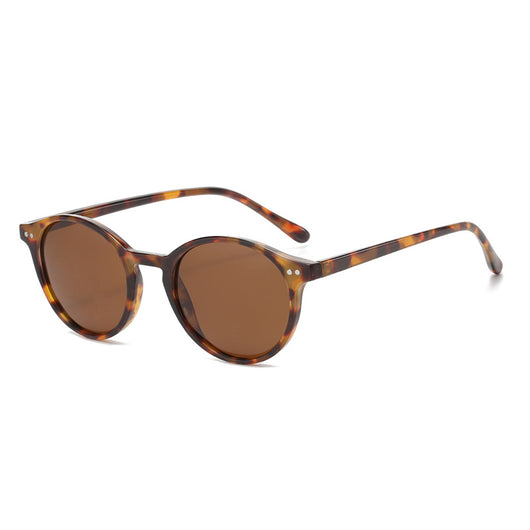 Round black full-rim sunglasses with vibrant blue polarized lenses, ideal for sun protection and fashion. - Image 8