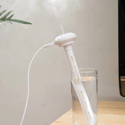 White USB humidifier with a long body, flat top, two cotton swabs, and an instruction manual on a white background. - Image 7