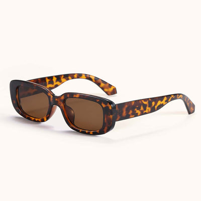 Rectangular tortoiseshell sunglasses with a small frame and dark gray lenses, angled on a white background. - Image 35