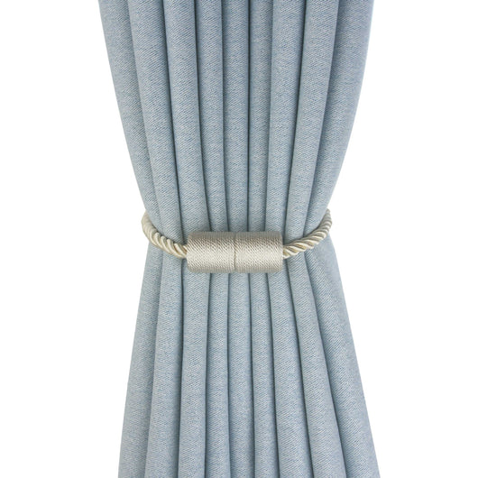 Black cylindrical magnetic curtain tieback holding a light blue pleated curtain, against a clean white background. - Image 4