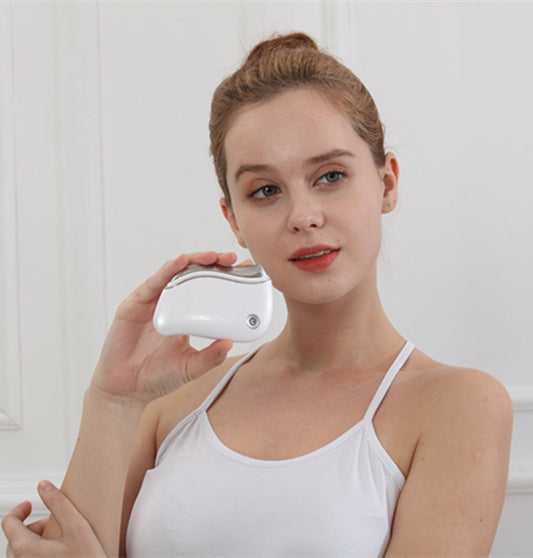 Masajeador Facial Térmico con Luz y Vibración