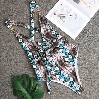 Women's snake print one-piece swimsuit with backless design, criss-cross straps, and a tie-front detail. - Image 6