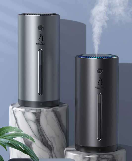 Dark gray cylindrical vehicle-mounted humidifier with a power button, mist outlet, and water level indicator. - Image 2