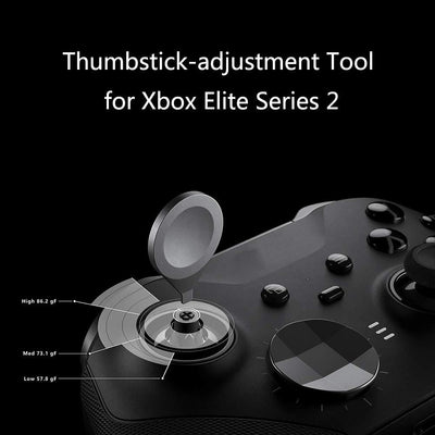 Xbox One Elite Series 2 controller accessory kit with black joysticks, silver D-pads, paddles, screwdrivers, and a storage bag.