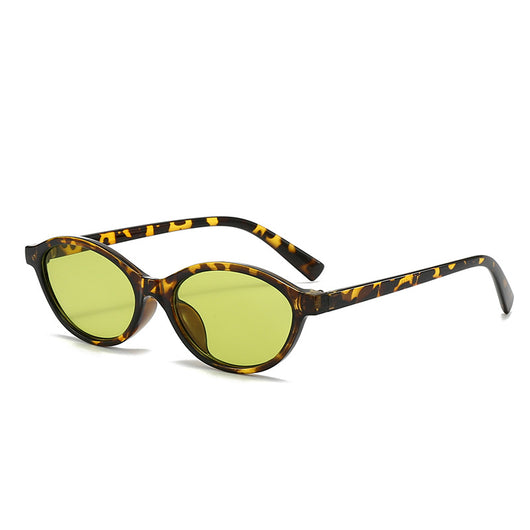 Retro fashion small frame sunglasses with translucent brown frames and yellow oval lenses, viewed from an angle. - Image 5