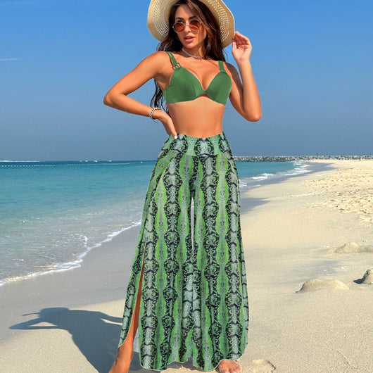Women's pink, black, and white abstract striped bikini with a push-up top and strappy high-cut bottoms on a beach. - Image 11