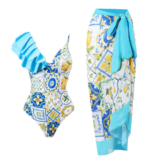 Women's one-shoulder ruffled swimsuit and matching sarong with blue and yellow lemon tile print. - Image 6