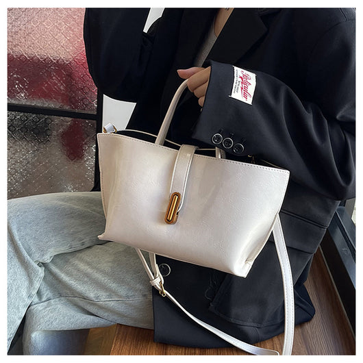 Bolso Bucket de Cuero Encerado Elegante y Portátil - Image 38