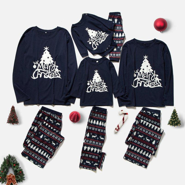 Matching navy blue family Christmas pajamas with white Christmas tree and "Merry Christmas" text, paired with patterned bottoms.
