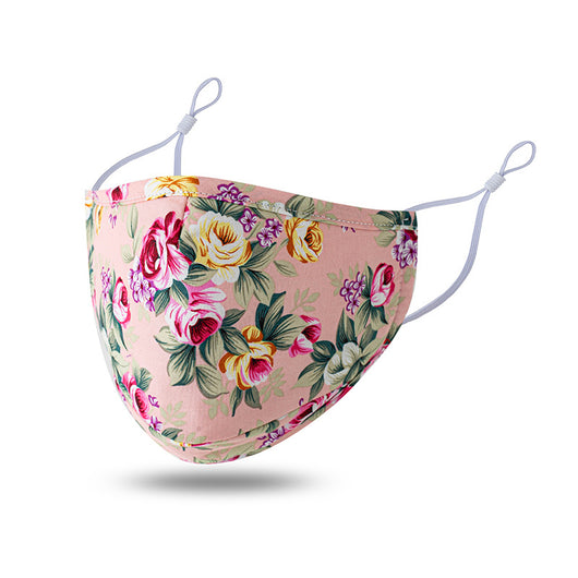Teal cotton face mask with white floral pattern and brown leaves, featuring adjustable white ear loops. - Image 3