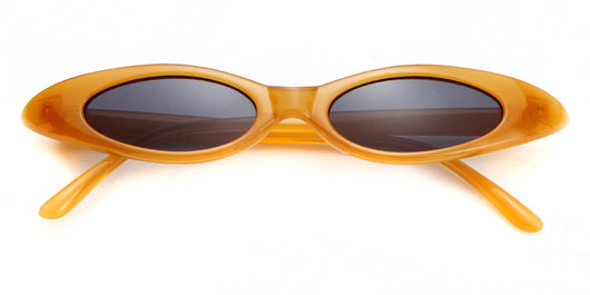 Clear frame cat eye sunglasses with bright yellow lenses, suitable for fashion wear and sun protection. - Image 46