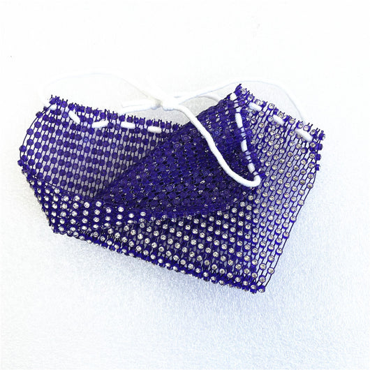 Close-up of a blue mesh fabric adorned with numerous small, clear rhinestones, creating a sparkling texture. - Image 67