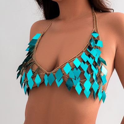 Woman wearing a gold-tone body chain top with iridescent pink and orange diamond-shaped sequins, perfect for beach or festival. - Image 58