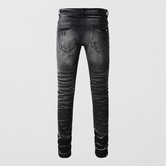 Jeans Vintage Desgastado con Parches y Roturas - Image 2