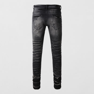 Jeans Vintage Desgastado con Parches y Roturas - Image 2