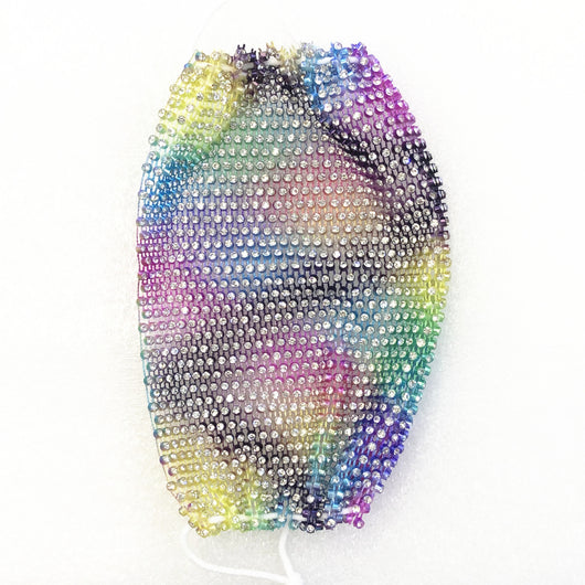 Close-up of a blue mesh fabric adorned with numerous small, clear rhinestones, creating a sparkling texture. - Image 25