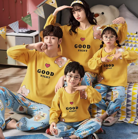 Family of four wearing matching yellow long-sleeved cotton pajamas with a cute panda design and "HUG ME!" text. - Image 3