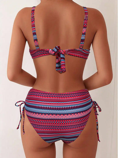 Blue, white, and black geometric print bikini with spaghetti strap bandeau top and high-waisted side-tie bottoms. - Image 23