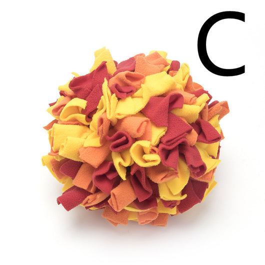Red, yellow, and orange polar fleece snuffle ball pet toy for chewing and enrichment. - Image 5