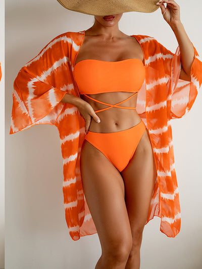 Women's orange and white tie-dye chiffon three-piece swimsuit with a bandeau bikini top and matching bottoms. - Image 10