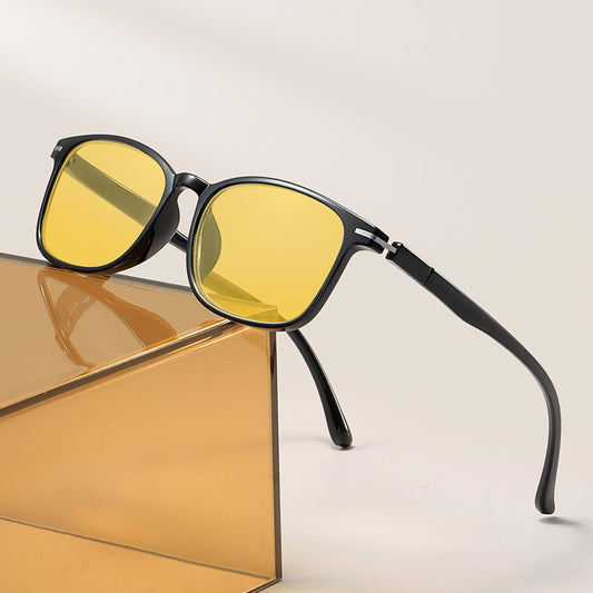 Purple frame glasses with yellow night vision lenses, featuring a subtle glitter effect on the temples.
