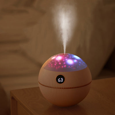 Pink spherical humidifier with a white top, ribbed texture, rose gold band, and a digital display showing 73%. - Image 2