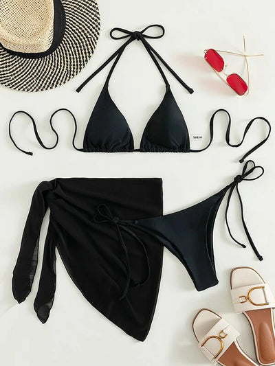 Neon yellow three-piece bikini set with triangle cup lace-up top, tie-side bottom, and matching sarong, displayed with a straw hat and sunglasses. - Image 11