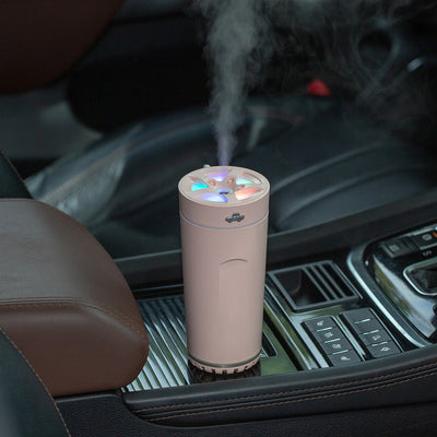 Gray cylindrical USB aromatherapy humidifier with a silver band and car icon on top, designed for car use. - Image 3