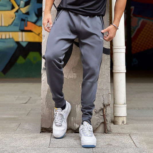 Pantalones de Chándal con Bolsillos de Cierre y Tela Elástica