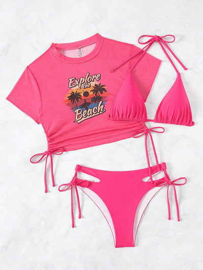 Black three-piece swimsuit with a mesh crop top featuring an "Explore the Beach" graphic, bikini top, and high-waisted bottoms. - Image 15