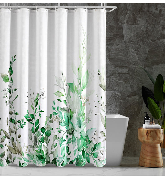 White shower curtain with a vibrant green botanical leaf print, hanging in a bright, modern bathroom. - Image 9