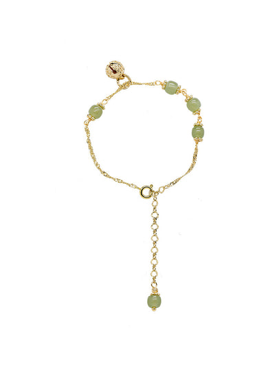 Pulsera de Jade Hetian Natural con Diseño Étnico Tradicional - Image 7