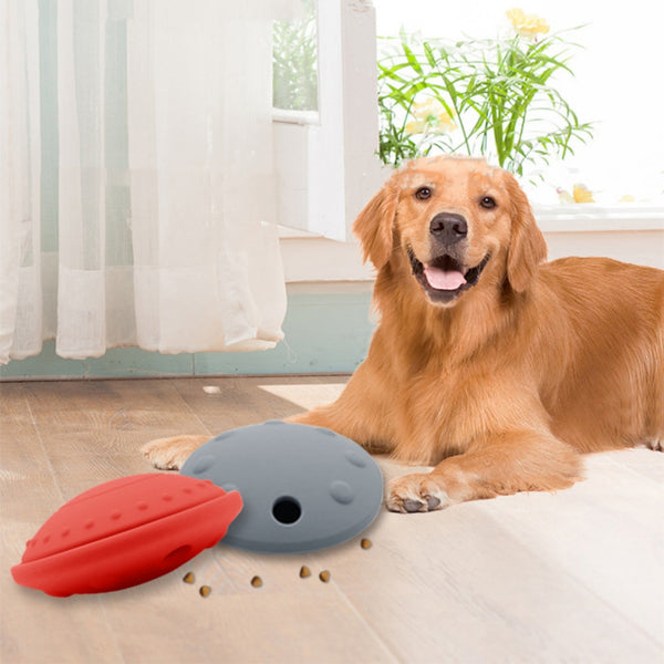Purple UFO-shaped silicone pet toy with textured top and openings for slow feeding or interactive play.