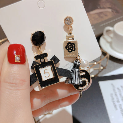 Aretes Circulares Dorados con Perla y Moño - Diseño Elegante y Trendy - Image 14