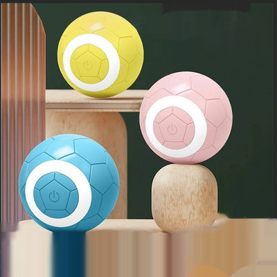 Yellow electric pet toy ball with a soccer ball pattern and a white ring around a central power button.
