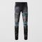 Jeans Vintage Desgastado con Parches y Roturas