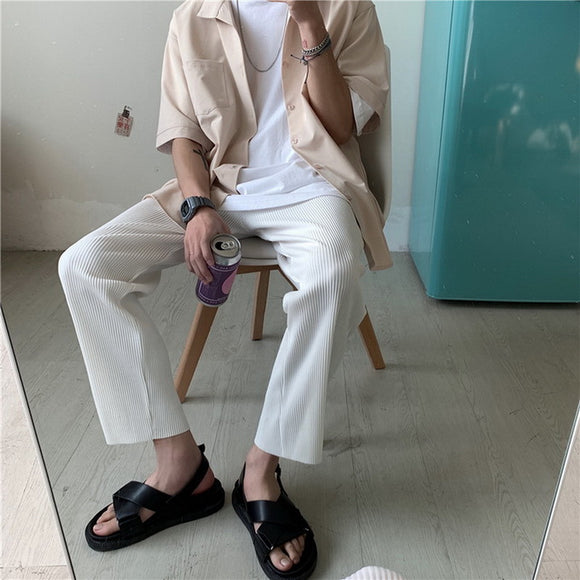 Pantalones Sueltos con Pliegues - Comodidad y Estilo Moderno