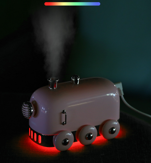 Pink retro mini train ultrasonic humidifier and aroma diffuser with rose gold accents on a white background. - Image 11