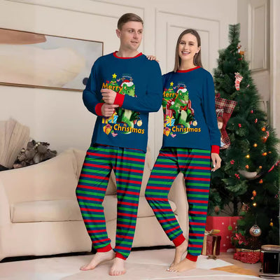 Child's blue long-sleeve Christmas pajamas with a dinosaur graphic and red and green striped pants. - Image 3