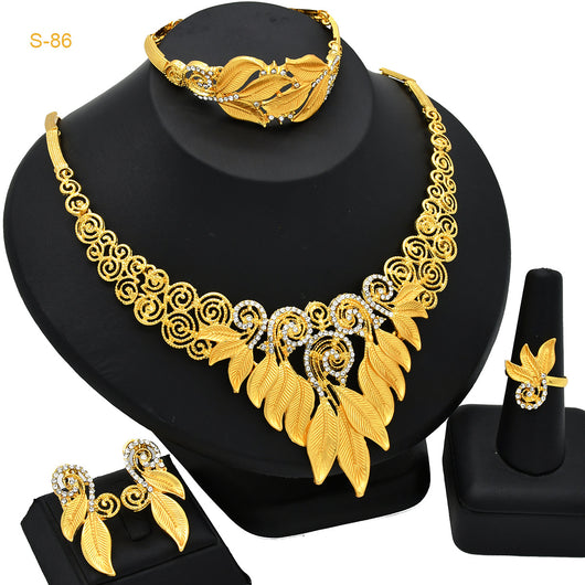 Women's Saudi bridal four-piece gold-colored jewelry set with floral and leaf designs, featuring a necklace, bracelet, earrings, and ring. - Image 5