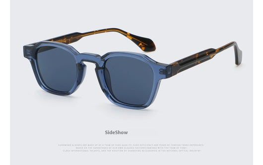 Classic fashion sunglasses with a black and tortoiseshell quadrilateral frame and dark green lenses, angled view. - Image 18