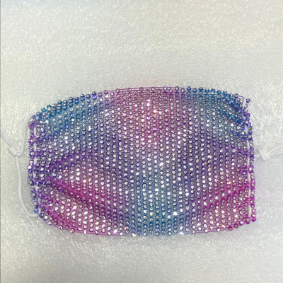 Close-up of a blue mesh fabric adorned with numerous small, clear rhinestones, creating a sparkling texture. - Image 63