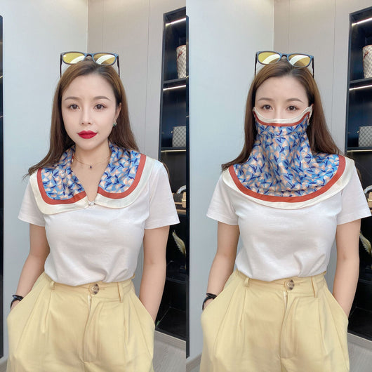 Female cream and black floral polka dot sun protection mask with ear loops, designed for eye corner protection. - Image 5