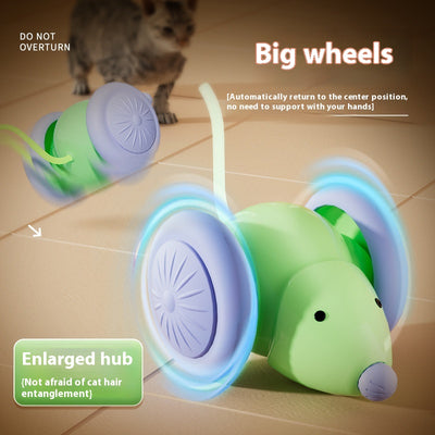 Green and purple electric mouse car cat toy with a glowing tail on a woven mat, designed for interactive play. - Image 3